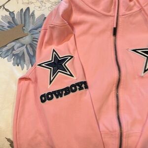 Like new-bought the wrong size cute excellent quality Dallas cowboy hoodie